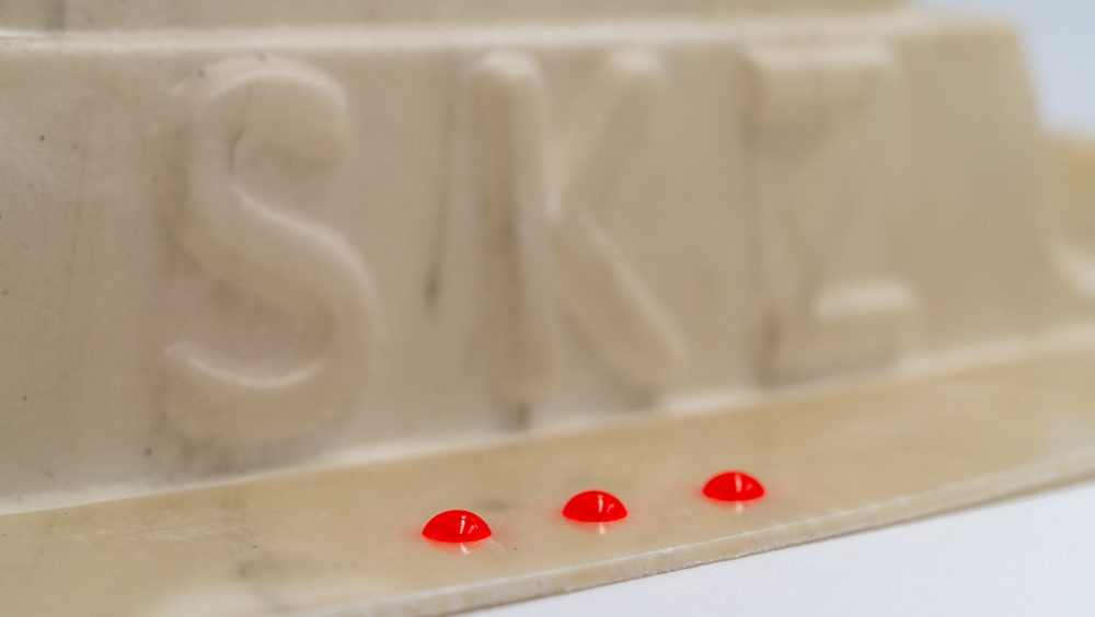 Benetzungsprüfung eines thermogeformten Rezyklat-Bauteils Benetzungsprüfung eines thermogeformten Rezyklat-Bauteils